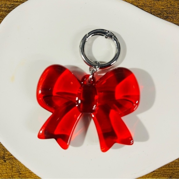 Anthropologie Handbags - Clear red bow bag charm silver key ring FREE